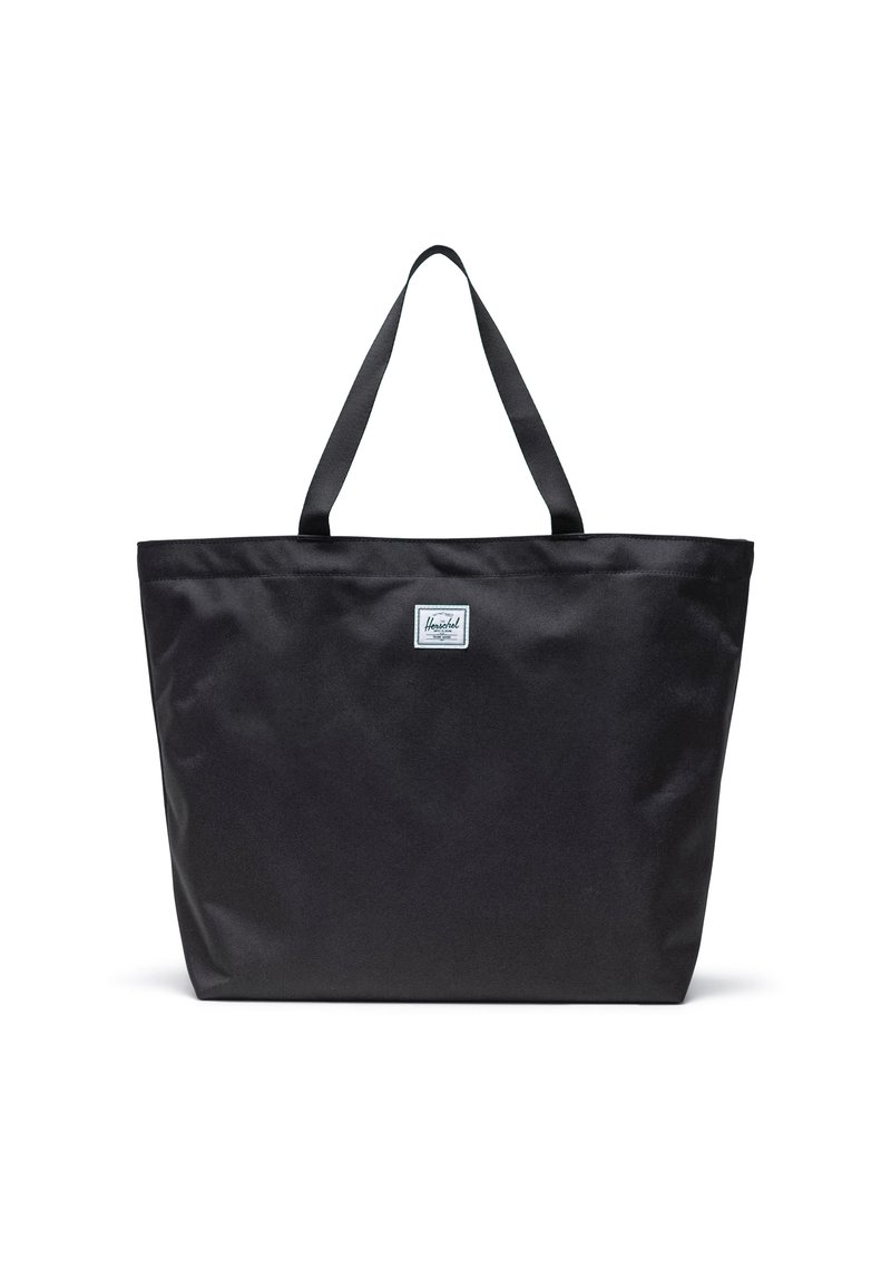 Borsa tote nera realizzata in tessuto resistente, con due manici robusti e una piccola etichetta del marchio in tessuto sul davanti. Forma rettangolare semplice.