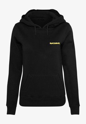 Czarna bluza z kapturem z przednią kieszenią. Posiada żółty grafikę "IRON MAIDEN" na klatce piersiowej. Wykonana jest z miękkiego, strukturalnego materiału.
