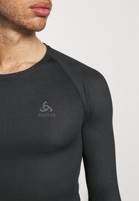 Odlo F-dry Light Eco heren functioneel ondergoed lange broek Odlo F-dry Light Eco heren functioneel ondergoed lange broek