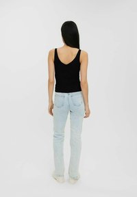 Vero Moda - Cardigan in maglia color crema a coste | ASOS