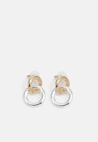 Gold and silver metal earrings featuring interlocking circular links, a polished finish, and stud backing for secure wear.