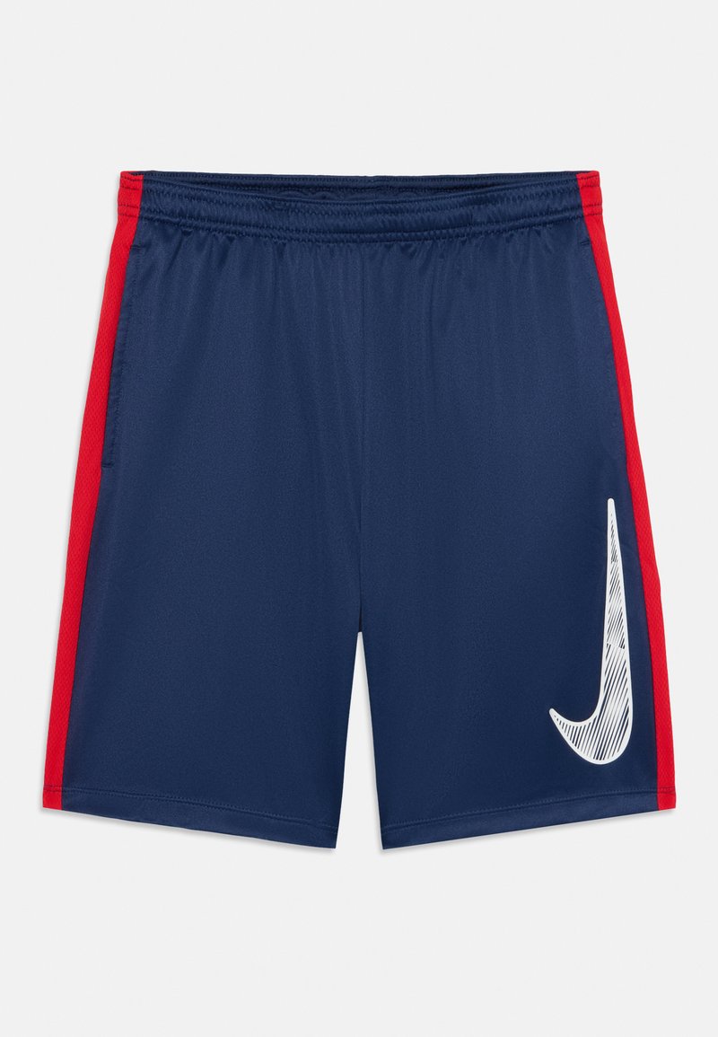 Sinised spordilühikesed püksid punaste külgpaneelidega, elastne vöökoht ja valge Nike logo vasakul ees. Sile kangas.