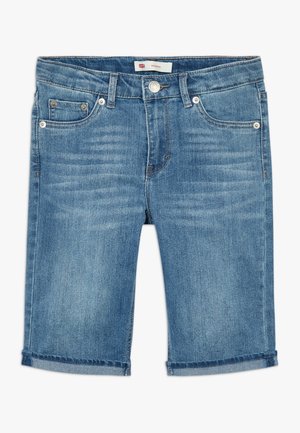 Short en jean bleu jusqu'aux genoux avec poches avant, passants pour ceinture, fermeture par bouton et une petite étiquette Levi's à l'intérieur de la ceinture.