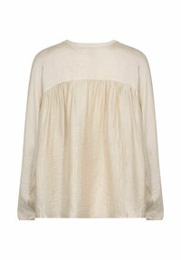 Lys beige langærmet bluse med en krøllet tekstur, der har et samlet design bagtil og en rund halsudskæring. Blødt, let stof.