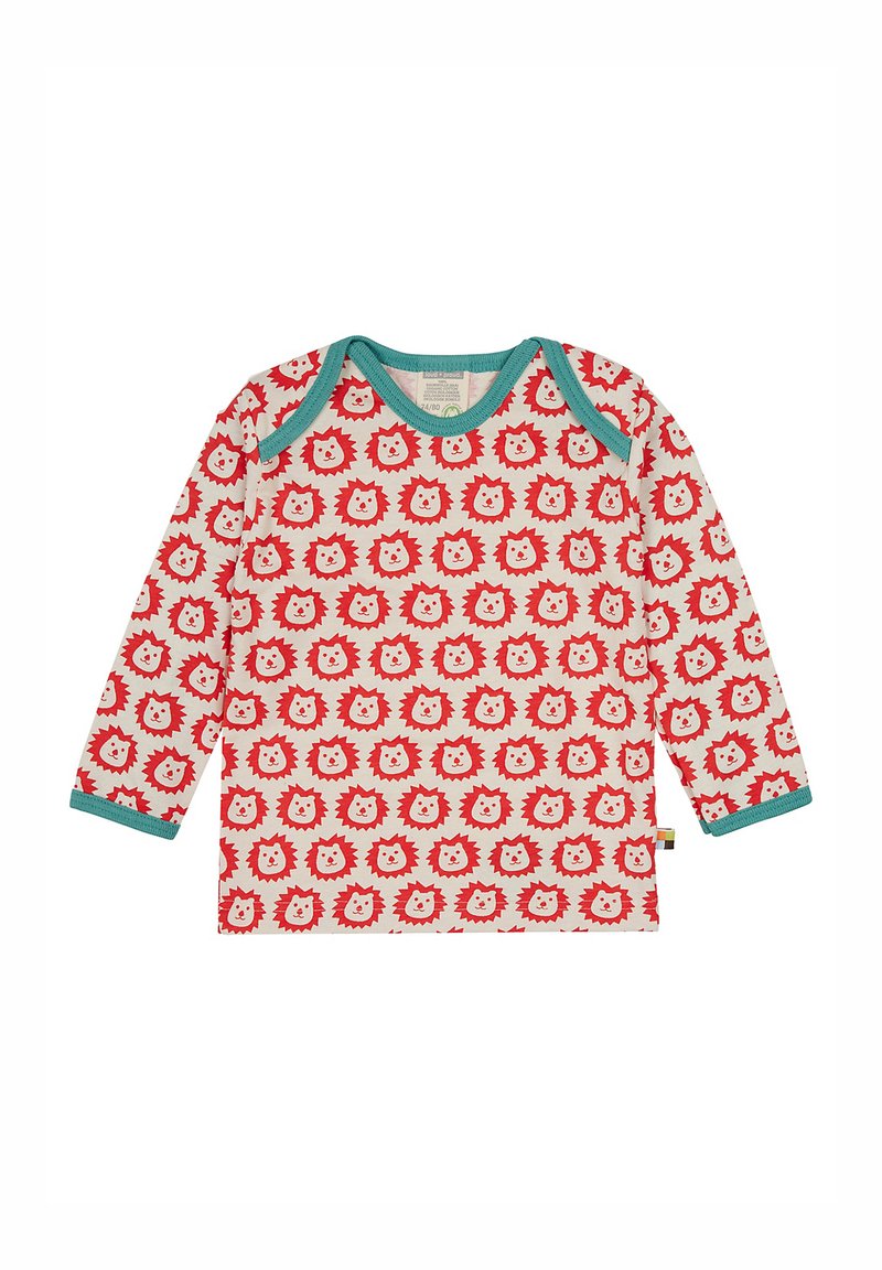 Maglietta rossa a maniche lunghe con stampa di leone in bianco e arancione, con colletto e polsini in teal. Realizzata in tessuto morbido e leggero.