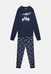 T-shirt de pyjama à manches longues bleu marine avec un graphique de squelette de dinosaure blanc et le texte "ROAR". Pantalons de pyjama assortis avec des motifs de dinosaures blancs.