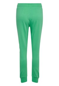 Hummel LEGACY TAPERED  - Jogginghose - green spruce