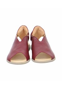 Burgundy leather sandals with open toe, cutout design, and beige sole. Features an adjustable strap for secure fit. Smooth texture.