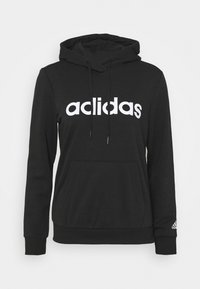 Sweat à capuche noir avec le texte blanc "aclidas" sur la poitrine, poche kangourou à l'avant, cordons de serrage sur la capuche et petit logo sur le poignet de la manche gauche.
