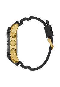 Bracciale dell'orologio in caucciù nero con cassa in acciaio inox dorato. Presenta due pulsanti e una superficie testurizzata. Quadrante dell'orologio rettangolare e trasparente.