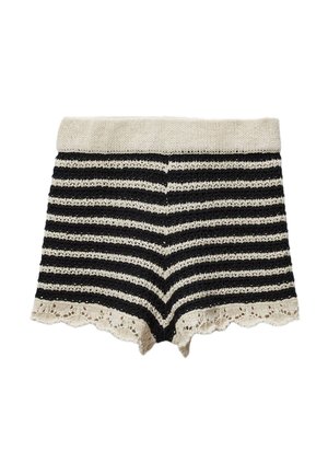 Shorts en tricot à rayures noir et crème avec un ourlet festonné. Le tissu présente une texture et une taille élastique.