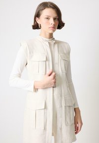 SAFARI - Brezrokavnik - Beige