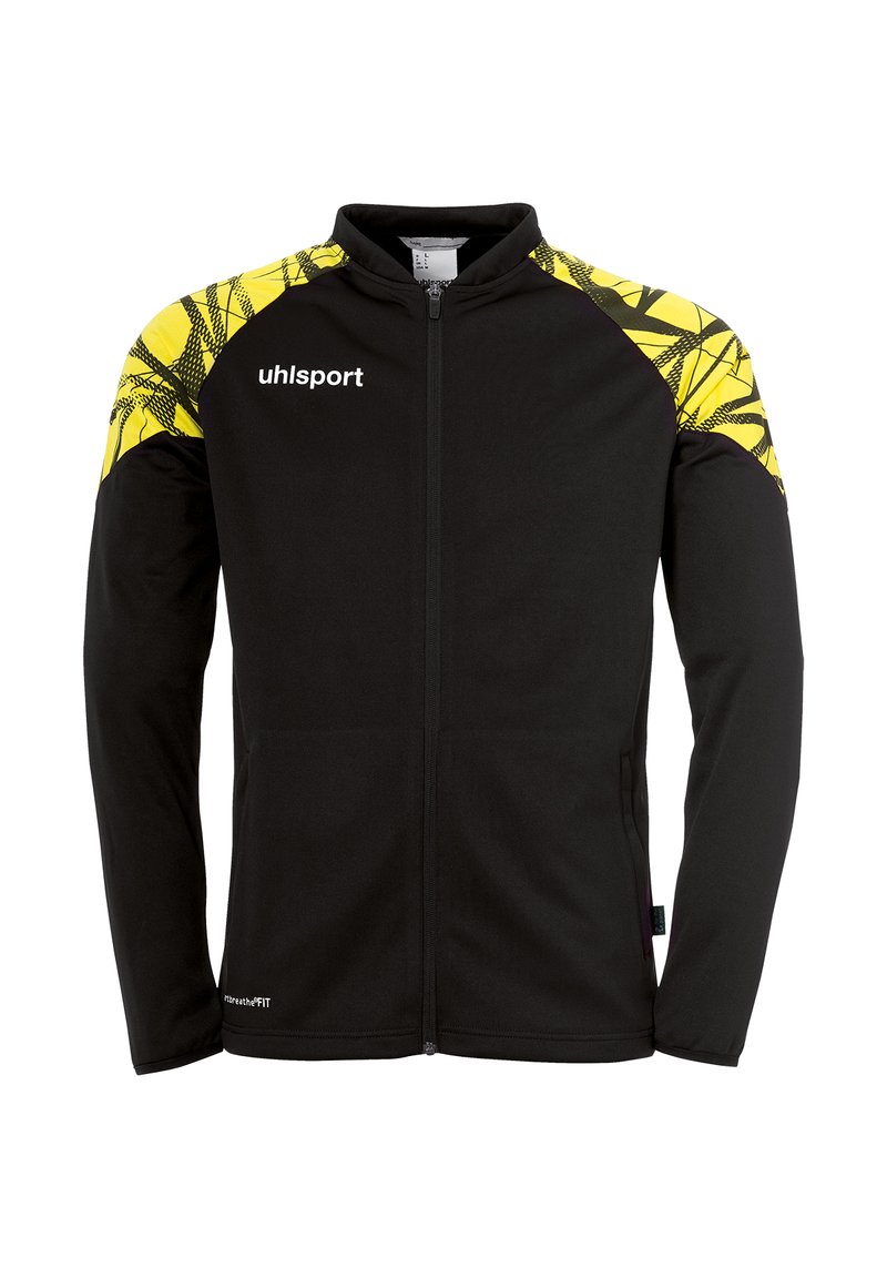 Sort atletisk jakke med fuld lynlås, gule mønstrede skuldre og "uhlsport" logo på brystet. Blødt, strækbart materiale.