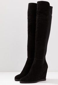 KIOMI Botas de cuña - black
