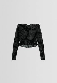 Czarna, przezroczysta bluzka z długim rękawem z motywem motyli, z okrągłym dekoltem i krótkim krojem. Wykonana z lekkiej, teksturowanej tkaniny.