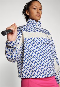 J.LINDEBERG Sports MINNA ANORAK - Windbreaker - moonbeam