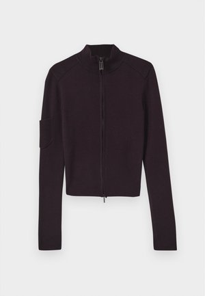 Black zip-up sweater with a high collar, ribbed accents on shoulders, and a patch pocket on the left sleeve. Soft knit material.