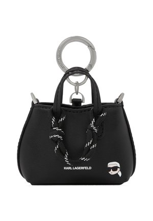 Sort mini håndtaske-nøglering med dobbelte håndtag, knyttet rebdetalje, sølv ringvedhæng, teksten "KARL LAGERFELD" og tegneserie-logo på forsiden.