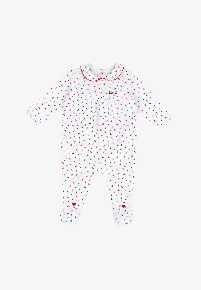 Pyjama blanc pour bébé avec des imprimés en forme de cœur rouges, doté de manches longues, d'un col et d'une fermeture à boutons, fabriqué en tissu côtelé doux.