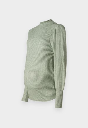Hele roheline soonikknit rasedus-sviiter pikade varrukatega ja kõrge kaelusega, loodud sobituma beebikõhuga.
