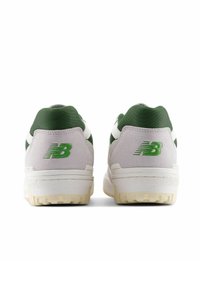 Green and grey sneakers with textured suede and mesh construction. Features white accents and a prominent green logo on the heel.