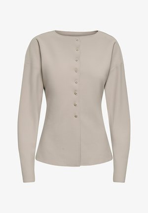 Bēšas krāsas garām piedurknēm ar pogu aizdares kardigans ar apaļu izgriezumu un mazu, saskaņotu pogu rindu priekšpusē.