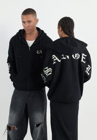 TEDDY JACKET UNISEX - Veste polaire - black