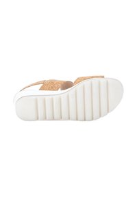 Cork sandals with two wide straps, white rubber sole, textured surface, and ridged pattern on the sole for traction.