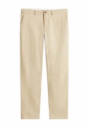 Pantalon beige en coton, à coupe droite, avec poches avant, fermeture par bouton et une texture subtile.