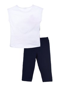 White cotton sleeveless top paired with navy cotton leggings, featuring a simple design and regular fit. Leggings have an elastic waistband.