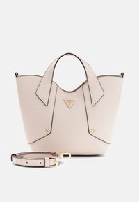 Petit sac à main en cuir beige avec doubles poignées, plaque logo dorée à l'avant, et bandoulière assortie amovible posée à côté.