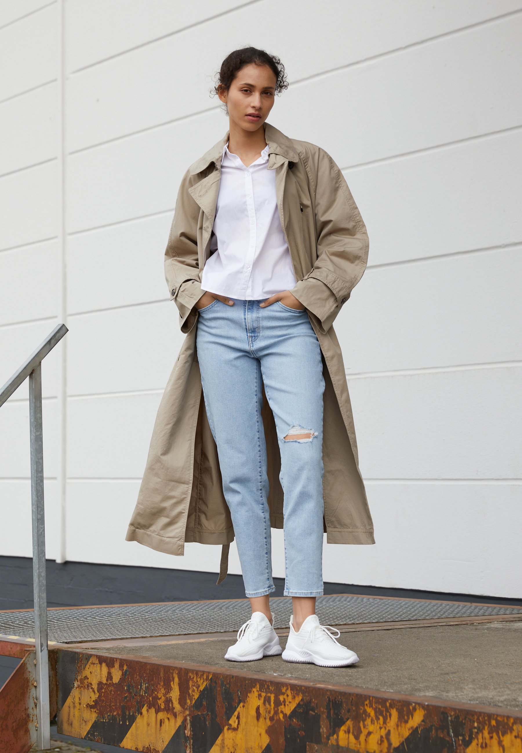 white and khaki trainers