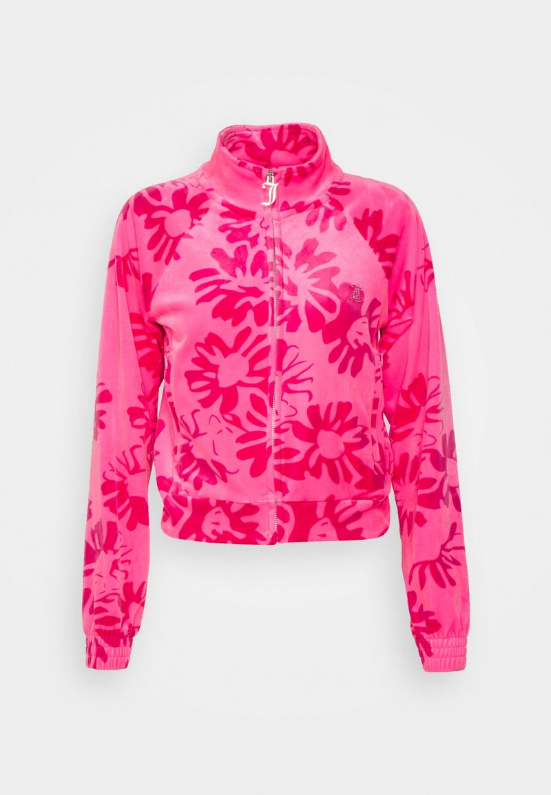 Fleece jas met rits in levendig roze met donkerroze bloemenpatronen, hoge kraag en elastische manchetten. Kort model met een strakke pasvorm.