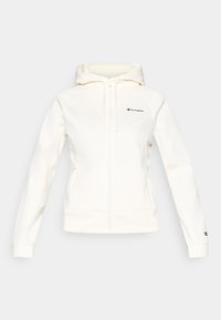 Λευκό φούτερ με φερμουάρ και κουκούλα, κατασκευασμένο από μαλακό ύφασμα. Διαθέτει μαύρο λογότυπο στο στήθος και στο μανίκι, με ριμπ τελείωμα και μανσέτες.