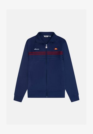 Marineblaue Zip-Jacke aus glattem Material mit hohem Kragen, zwei seitlichen Taschen, roten und blauen Streifen auf der Vorderseite und Logodetails.