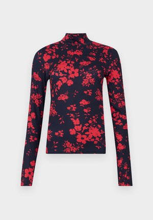 Camisola de gola alta de manga longa em azul-marinho com padrão floral vermelho, design ajustado e textura suave, apresentando gola alta e corte justo.