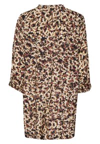 Blouse à manches longues coupe ample avec motif abstrait tacheté en beige, marron, noir et rose, vue de dos.