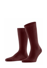 Calzini lavorati a maglia color bordeaux con un motivo a texture e polsini a costine; altezza media e materiale morbido per il massimo comfort.