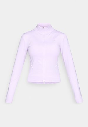 Veste zippée de couleur violet clair avec manches longues, en tissu lisse. Présente un col montant et un logo argenté sur le côté gauche de la poitrine.