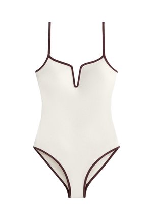 White one-piece swimsuit with dark brown trim, thin shoulder straps, and a V-shaped notch neckline.