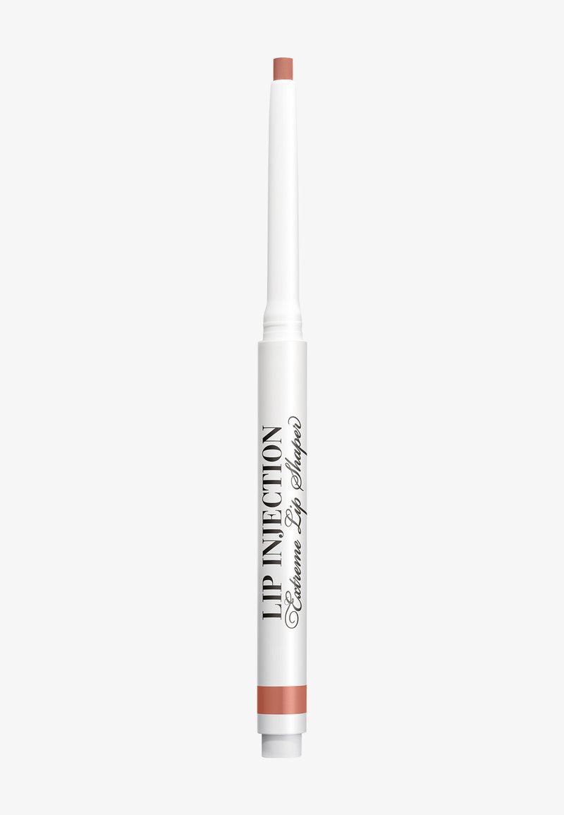 Uittrekbare lipliner in gedempte nude kleur met het label "Lip Injection Extreme Lip Shaper" op een witte achtergrond.