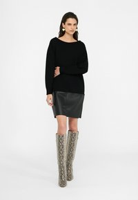 LIU JO KURZES - Abito in maglia - black