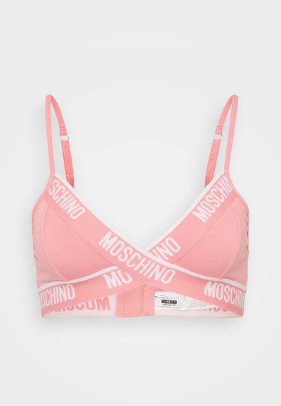 Bralette rosa de algodão com um design cruzado, apresentando a marca Moschino em branco nas alças e na banda inferior. Alças ajustáveis para um melhor ajuste.