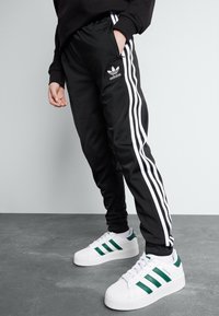 adidas Originals - TRACK PANTS UNISEX - Trainingsbroek - black/white Miniatuurafbeelding 1