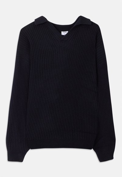 Black ribbed sweater with a V-neck and a folded collar. Features long sleeves and a textured knit pattern. Soft material.