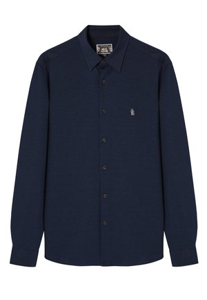Navy button-up shirt made of textured fabric, featuring a pointed collar, long sleeves, and a small embroidered design on the left chest.