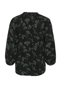 Blouse noire avec des motifs de plantes vertes, encolure froncée et manches bouffantes. Tissu doux avec une coupe décontractée, ourlet arrondi sur les côtés.