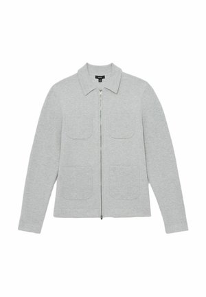 Pelēka aizdare jaka, kas izgatavota no adīta auduma, ar apkakli, divām priekšēj ām kabatas ieliktņiem un ribota tekstūra kabatas atlokos.