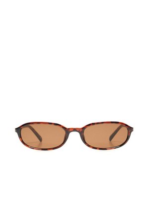 Lunettes de soleil ovales et fines avec verres teintés marron et montures à motif écaille.