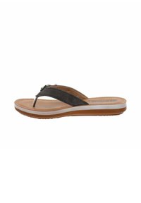 Sandale thong noire avec une sangle texturée, semelle de pied beige et semelle en caoutchouc marron. Présente un ornement décoratif sur la sangle.